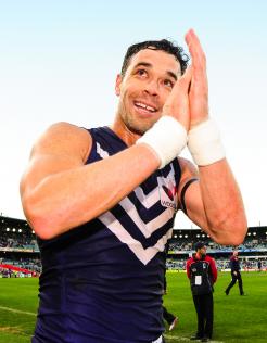 AFL 2013 Rd 12 - Fremantle v Brisbane 150 gamer Ryan Crowley of the Fremantle Dockers thanks the crowd after the 2013 AFL Round 12 match between the Fremantle Dockers and the Brisbane Lions at Patersons Stadium, Perth on June 15, 2013. (Photo: Daniel Carson/AFL Media)